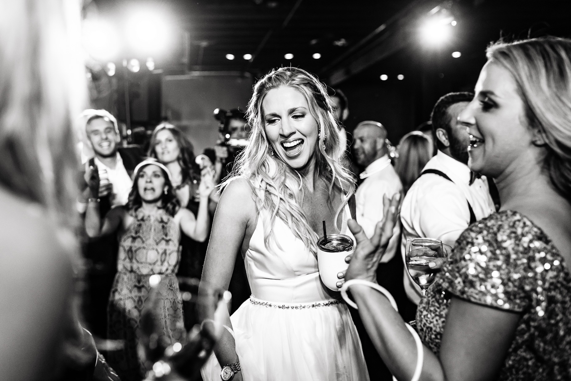 Austin-Wedding-Photographers-Downtown-Brazos-Hall-dancing-reception-bride