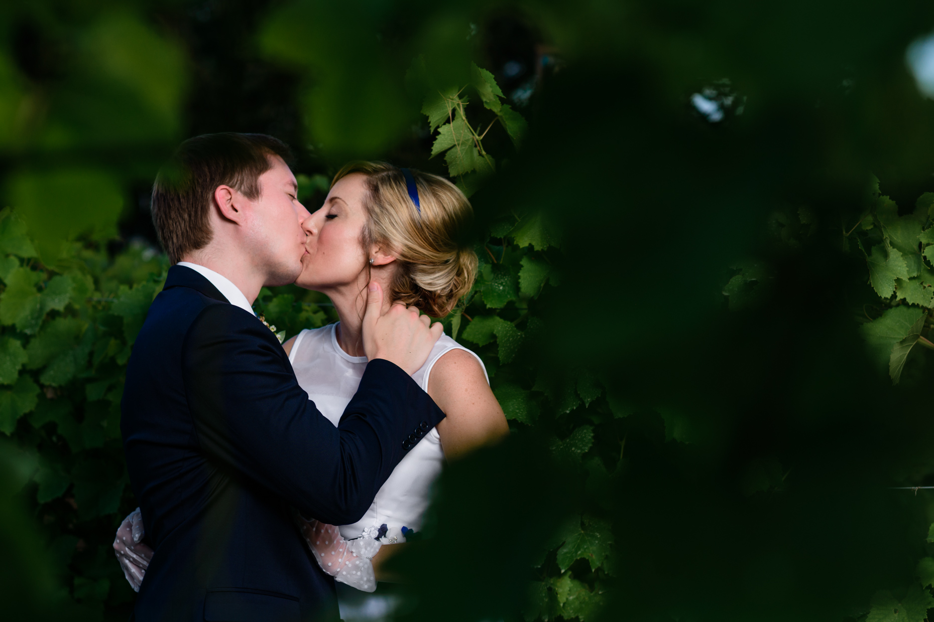 bride-groom-kissing-austin-wedding-photographers-vineyards-texas-love