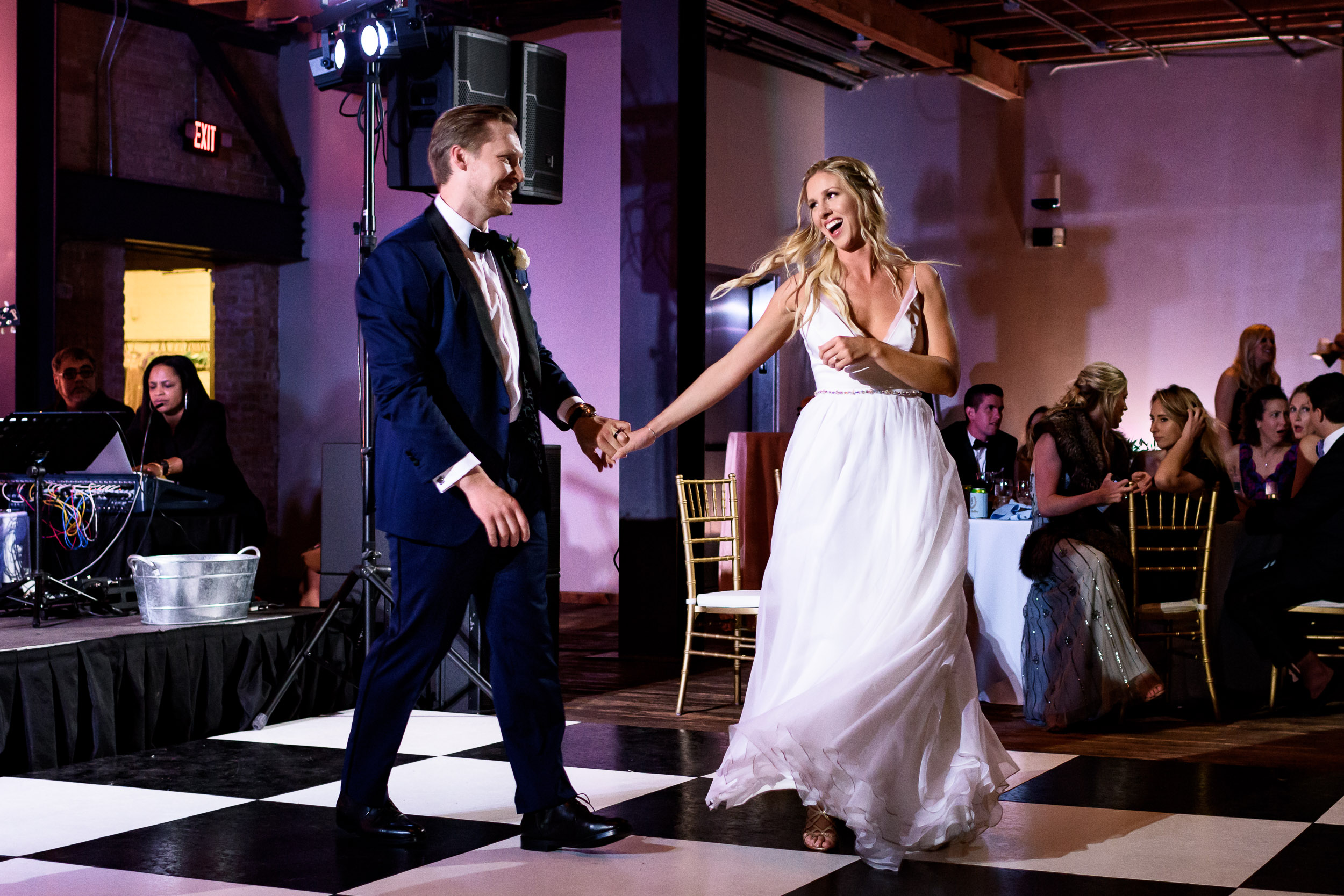 Austin-wedding-photographers-purple-uplighting-brazos-hall-downtown-twirl-first-dance