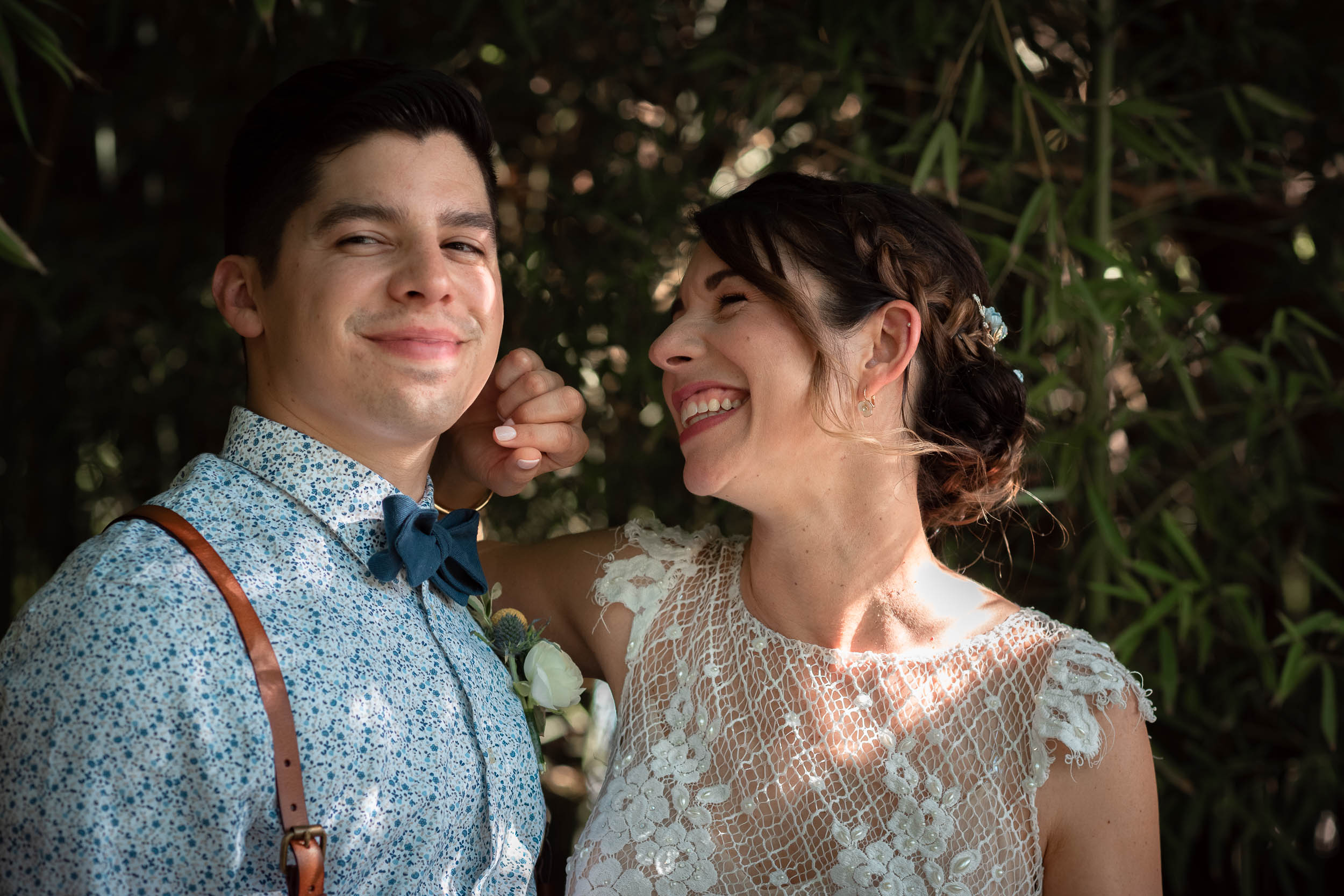 Mercury-Hall-Austin-Wedding-Photographers-bride-portrait-lace-dress-laughing