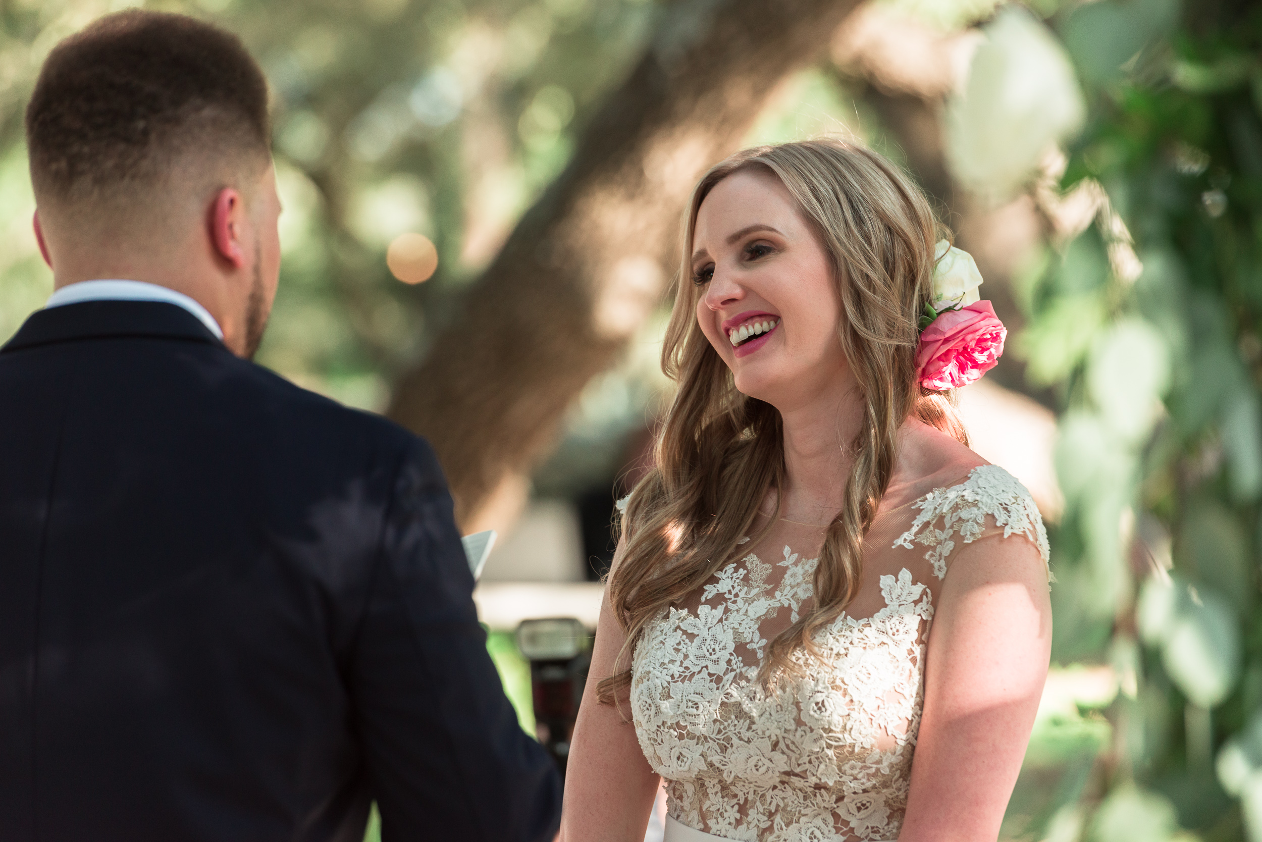 austin-wedding-photographers-ceremony-outdoor-addison-grove-laughter