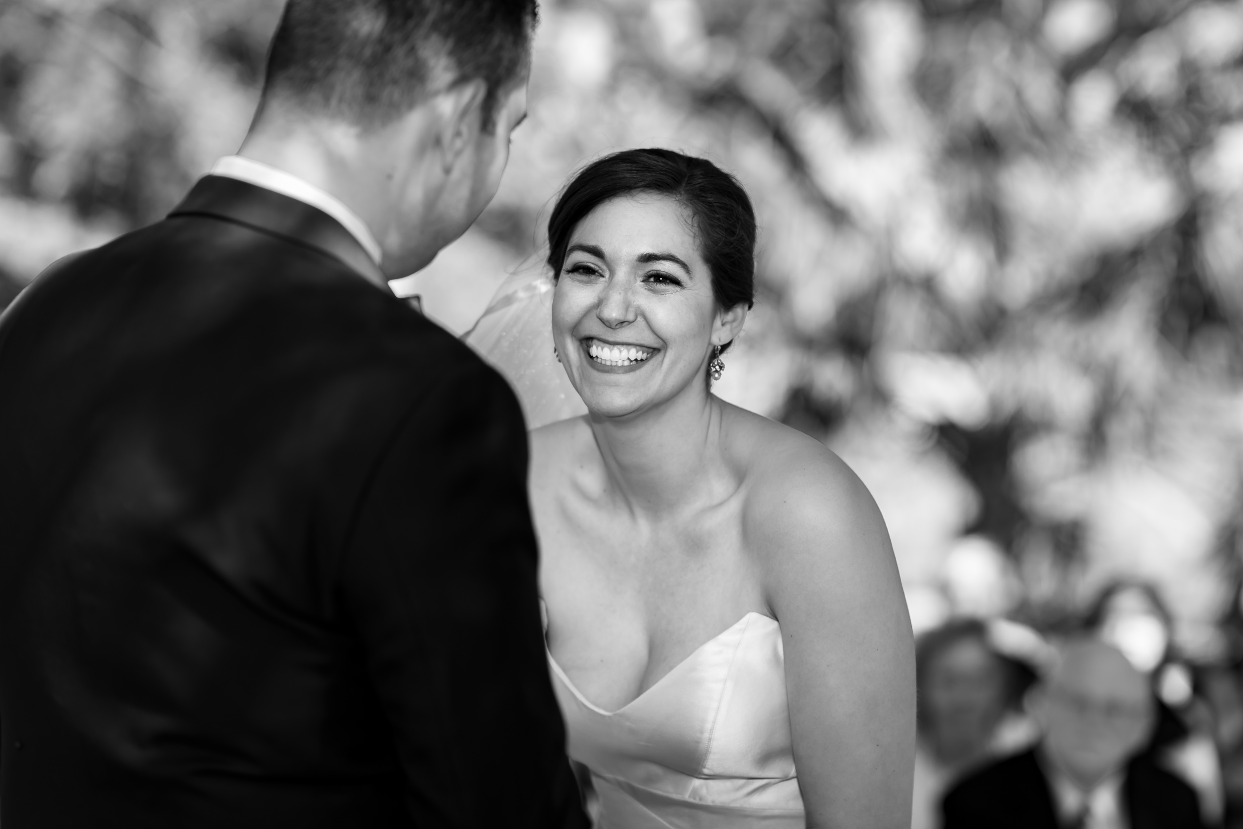 texas-austin-wedding-photographers-ceremony-bride-laughing-east-eden-farm